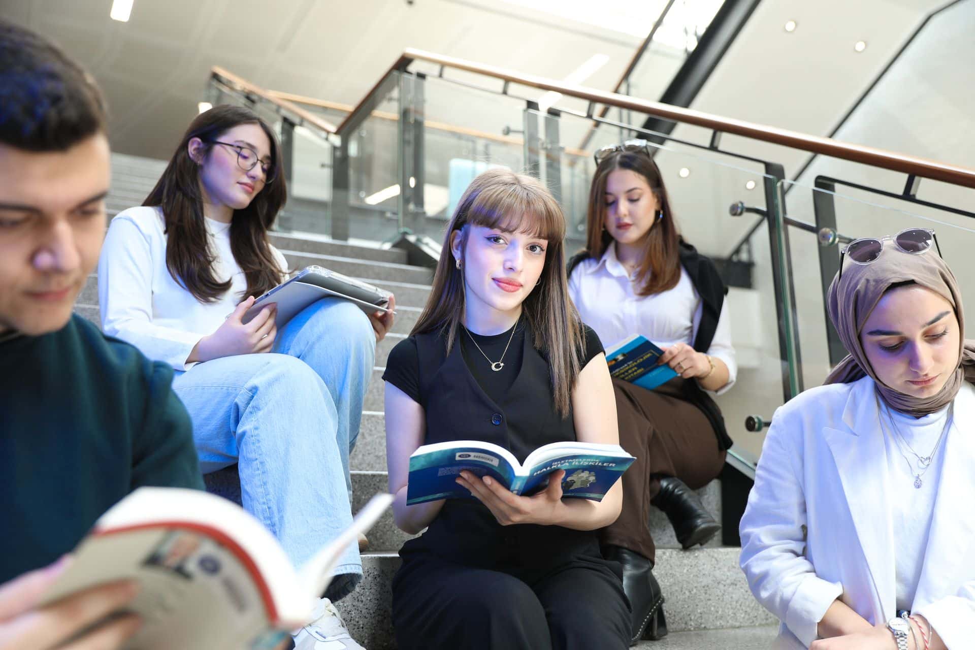 CNAM banner - students reading stairs